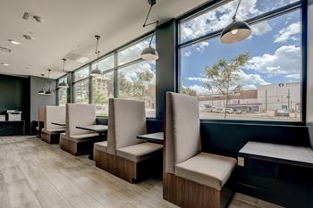 Multiple co-working spaces w/ refrigerators, coffee and microwaves